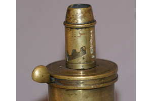 A Very Nice Large 19th Century Red Leather Covered Bag Shaped Powder Flask